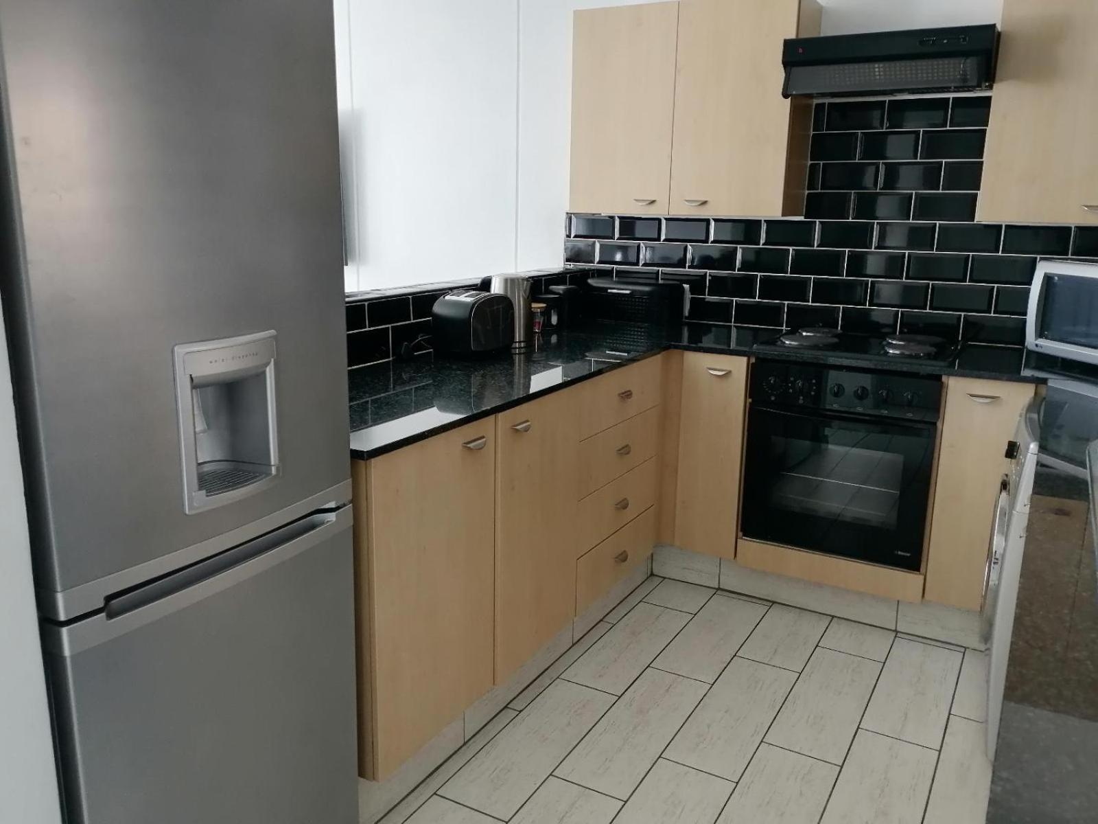 Emabheleni Executive Suites Westpoint Joanesburgo Quarto foto